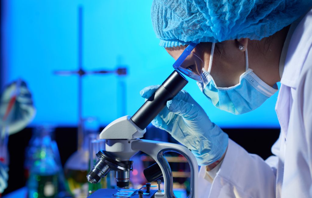 Examining Sample with Microscope